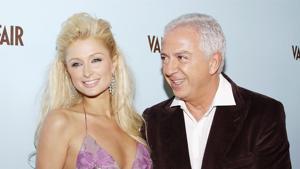 Model Paris Hilton poses with fashion designer Paul Marciano at the launch of Marciano hosted by Vanity Fair on October 19, 2004 at Dolce in Hollywood, California.(AFP) Model Paris Hilton poses with fashion designer Paul Marciano at the launch of Marciano hosted by Vanity Fair on October 19, 2004 at Dolce in Hollywood, California.(AFP)