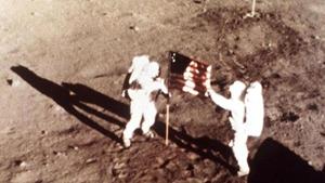 This July 20, 1969 file photo provided by NASA shows Apollo 11 astronauts Neil Armstrong and Edwin E "Buzz" Aldrin, the first men to land on the moon, plant the US flag on the lunar surface.(AP Photo/NASA) This July 20, 1969 file photo provided by NASA shows Apollo 11 astronauts Neil Armstrong and Edwin E "Buzz" Aldrin, the first men to land on the moon, plant the US flag on the lunar surface.(AP Photo/NASA)