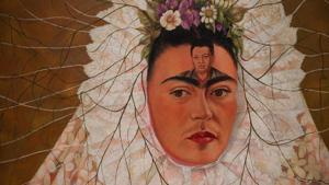 A painting entitled 'Self-portrait as a Tehuana', Frida, Kahlo, 1943, Mexico City is displayed at the exhibition.(AFP)