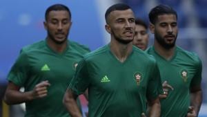 Morocco's Romain Saiss, middle, with teammates, warm-up during their training on the eve of the Group B match vs Iran at the FIFA World Cup 2018 in the St. Petersburg Stadium on Thursday.(AP) Morocco's Romain Saiss, middle, with teammates, warm-up during their training on the eve of the Group B match vs Iran at the FIFA World Cup 2018 in the St. Petersburg Stadium on Thursday.(AP)