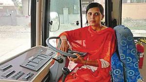Archana on the wheel of a Karnal city bus.(HT Photo) Archana on the wheel of a Karnal city bus.(HT Photo)