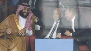 Saudi Arabia Crown Prince Mohammed bin Salman, left, FIFA President Gianni Infantino, center, and Russian President Vladimir Putin watch the opening match of the FIFA World Cup 2018 between Russia and Saudi Arabia at the Luzhniki stadium in Moscow, Thursday.(AP)