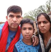 Retired Lance Naik Yagya Pratap Singh (36) with his wife and a son(HT Photo)