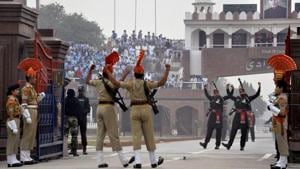 BSF and Pakistan Rangers perform the beating of the retreat ceremony at the Attari- Wagah border.(PTI File) BSF and Pakistan Rangers perform the beating of the retreat ceremony at the Attari- Wagah border.(PTI File)