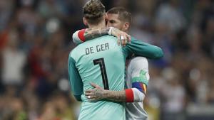 Spain's defender Sergio Ramos (R) hugs Spain's goalkeeper David De Gea at the end of the Russia 2018 World Cup Group B football match between Portugal and Spain at the Fisht Stadium in Sochi on June 15, 2018.(AFP) Spain's defender Sergio Ramos (R) hugs Spain's goalkeeper David De Gea at the end of the Russia 2018 World Cup Group B football match between Portugal and Spain at the Fisht Stadium in Sochi on June 15, 2018.(AFP)
