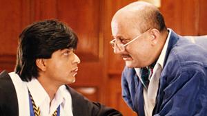 A young Shah Rukh Khan with Anupam Kher as hid dad in Dilwale Dulhania Le Jayenge. A young Shah Rukh Khan with Anupam Kher as hid dad in Dilwale Dulhania Le Jayenge.