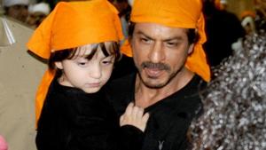 Shah Rukh Khan often shares photos of his son AbRam on social media.(IANS) Shah Rukh Khan often shares photos of his son AbRam on social media.(IANS)