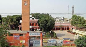 The iconic red brick clock tower, named after former principal Nand Lal Kalra, and adjoining Dayanand Hall with a brass bell and flag atop the AS High School campus are difficult to miss as one drives past Khanna on a flyover on National Highway-1 from Ludhiana towards Patiala.(Bharat Bhushan/HT) The iconic red brick clock tower, named after former principal Nand Lal Kalra, and adjoining Dayanand Hall with a brass bell and flag atop the AS High School campus are difficult to miss as one drives past Khanna on a flyover on National Highway-1 from Ludhiana towards Patiala.(Bharat Bhushan/HT)