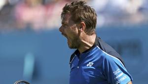 Stan Wawrinka reacts as he plays Britain's Cameron Norrie on day one of the Queen's Club Championship at the Queens Club, in London on June 18, 2018.(AP) Stan Wawrinka reacts as he plays Britain's Cameron Norrie on day one of the Queen's Club Championship at the Queens Club, in London on June 18, 2018.(AP)