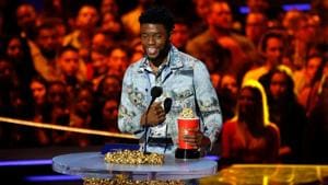 Actor Chadwick Boseman accepts the Best Performance in a Movie award at the 2018 MTV Movie & TV Awards at Barker Hangar in Santa Monica, California.(REUTERS) Actor Chadwick Boseman accepts the Best Performance in a Movie award at the 2018 MTV Movie & TV Awards at Barker Hangar in Santa Monica, California.(REUTERS)