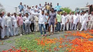 Vegetables lie scattered on a road during farmers protest in Hisar on June 03.(PTI Photo)