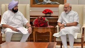 Prime Minister Narendra Modi with Punjab chief minister Amarinder Singh in New Delhi on Monday.(PTI Photo) Prime Minister Narendra Modi with Punjab chief minister Amarinder Singh in New Delhi on Monday.(PTI Photo)