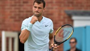 Bulgaria's Grigor Dimitrov reacts after winning a point against Bosnia and Herzegovina's Damir Dzumhur during their first round men's singles match at the ATP Queen's Club Championships.(AFP) Bulgaria's Grigor Dimitrov reacts after winning a point against Bosnia and Herzegovina's Damir Dzumhur during their first round men's singles match at the ATP Queen's Club Championships.(AFP)