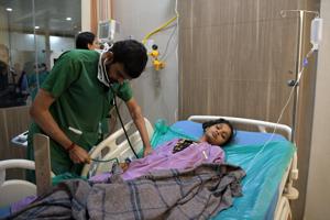One of the Mahad villagers suffering from food poisoning admitted to DY Patil Hospital, Nerul, on Tuesday.(BACHCHAN KUMAR/HT PHOTO) One of the Mahad villagers suffering from food poisoning admitted to DY Patil Hospital, Nerul, on Tuesday.(BACHCHAN KUMAR/HT PHOTO)