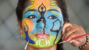 A college student gets her face painted during an event to commemorate International Day of Yoga 2018, in Chennai on June 20, 2018.(PTI) A college student gets her face painted during an event to commemorate International Day of Yoga 2018, in Chennai on June 20, 2018.(PTI)