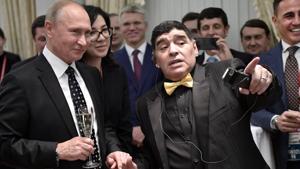 President of Russia Vladimir Putin, Diego Maradona and Fabio Cannavaro seen ahead of the 2018 FIFA World Cup Draw .(REUTERS) President of Russia Vladimir Putin, Diego Maradona and Fabio Cannavaro seen ahead of the 2018 FIFA World Cup Draw .(REUTERS)