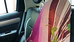 The body of the dead woman in the back seat of the car.(HT Photo) The body of the dead woman in the back seat of the car.(HT Photo)