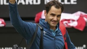 Switzerland tennis player Roger Federer waves after winning against France's Benoit Paire in their Round of 16 match at the ATP tennis tournament in Halle on Thursday.(AP) Switzerland tennis player Roger Federer waves after winning against France's Benoit Paire in their Round of 16 match at the ATP tennis tournament in Halle on Thursday.(AP)