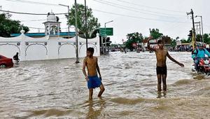 The road adjacent to the Sohana gurdwara turned into a pool after heavy rain on August 21 last year; and (left) the N-Choe is overgrown with weeds, leading to fears that it will overflow during the monsoon.(HT Photo) The road adjacent to the Sohana gurdwara turned into a pool after heavy rain on August 21 last year; and (left) the N-Choe is overgrown with weeds, leading to fears that it will overflow during the monsoon.(HT Photo)