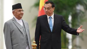 Nepal Prime Minister KP Sharma Oli (left) with Chinese Premier Li Keqiang during a welcome ceremony at the Great Hall of the People in Beijing.(AFP) Nepal Prime Minister KP Sharma Oli (left) with Chinese Premier Li Keqiang during a welcome ceremony at the Great Hall of the People in Beijing.(AFP)