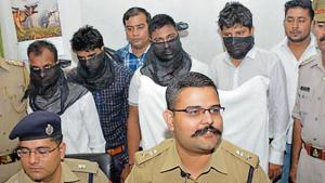 Vishal Dubey, the leader of the gang, his cousin Vivek Dubey and two of their friends Rahul Sharma and Sandeep Kumar, were arrested near Samrat Hotel in Indirapuram on Friday.(Sakib Ali/HT Photo) Vishal Dubey, the leader of the gang, his cousin Vivek Dubey and two of their friends Rahul Sharma and Sandeep Kumar, were arrested near Samrat Hotel in Indirapuram on Friday.(Sakib Ali/HT Photo)