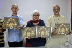 Bishop Allwyn D'silva, Auxiliary Bishop of the Archidocese of Bombay (extreme right), Dr Fleur D'Souza (centre) and Fr Gerry, parish priest, show the coffee table book.(Praful Gangurde/HT)