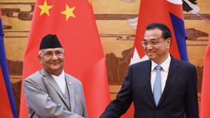 Nepal's Prime Minister K.P. Sharma Oli shakes hand with Chinese Premier Li Keqiang during a signing ceremony at the Great Hall of the People in Beijing, China June 21, 2018.(REUTERS) Nepal's Prime Minister K.P. Sharma Oli shakes hand with Chinese Premier Li Keqiang during a signing ceremony at the Great Hall of the People in Beijing, China June 21, 2018.(REUTERS)