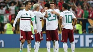 Mexico players celebrate after the match vs South Korea. Mexico won 2-1.(REUTERS) Mexico players celebrate after the match vs South Korea. Mexico won 2-1.(REUTERS)