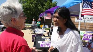 In this Thursday, June 14, 2018 photo, Del. Aruna Miller, right, who is seeking the Democratic nomination in Maryland's 6th Congressional District, talks to supporter Anne Davis at an early voting center in Germantown, Md.(AP) In this Thursday, June 14, 2018 photo, Del. Aruna Miller, right, who is seeking the Democratic nomination in Maryland's 6th Congressional District, talks to supporter Anne Davis at an early voting center in Germantown, Md.(AP)