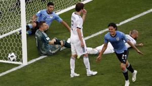 Uruguay's Edinson Cavani, right, celebrates after scoring his side's third goal during the Group A match vs Russia at the 2018 FIFA World Cup at the Samara Arena on Monday.(AP) Uruguay's Edinson Cavani, right, celebrates after scoring his side's third goal during the Group A match vs Russia at the 2018 FIFA World Cup at the Samara Arena on Monday.(AP)