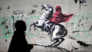 A recent artwork attributed to British activist-artist Banksy.(REUTERS) A recent artwork attributed to British activist-artist Banksy.(REUTERS)
