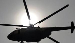 (FILES) This file photo taken on March 23, 2014 shows a Pakistani Air Force Mi-17 helicopter flies over the Presidential Palace during a parade marking the country's National Day in Islamabad.(AFP) (FILES) This file photo taken on March 23, 2014 shows a Pakistani Air Force Mi-17 helicopter flies over the Presidential Palace during a parade marking the country's National Day in Islamabad.(AFP)