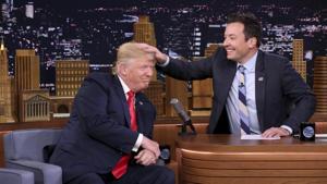US President Donald Trump appears with host Jimmy Fallon during a taping of The Tonight Show Starring Jimmy Fallon, in New York. Fallon is opening up about the personal anguish he felt following the backlash to his now-infamous hair mussing appearance with Donald Trump. Trump opponents criticized Fallon for a cringeworthy interview only weeks before the election where Fallon playfully stroked Trump’s hair.(AP) US President Donald Trump appears with host Jimmy Fallon during a taping of The Tonight Show Starring Jimmy Fallon, in New York. Fallon is opening up about the personal anguish he felt following the backlash to his now-infamous hair mussing appearance with Donald Trump. Trump opponents criticized Fallon for a cringeworthy interview only weeks before the election where Fallon playfully stroked Trump’s hair.(AP)