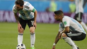 Argentina's Lionel Messi, left, is flanked by his teammate Ever Banega during the FIFA World Cup 2018 Group D match against Nigeria.(AP) Argentina's Lionel Messi, left, is flanked by his teammate Ever Banega during the FIFA World Cup 2018 Group D match against Nigeria.(AP)