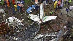 Forensic experts, fire department personnel and a dog squad inspect the crash site of a chartered plane at Old Malik Estate, Jeev Daya Lane, Ghatkopar, in Mumbai on June 28, 2018.(Vijayanand Gupta/HT Photo) Forensic experts, fire department personnel and a dog squad inspect the crash site of a chartered plane at Old Malik Estate, Jeev Daya Lane, Ghatkopar, in Mumbai on June 28, 2018.(Vijayanand Gupta/HT Photo)
