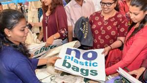 People scan through plastic-free products kept for sale during an exhibition on plastic ban awareness, in Mumbai on Friday, June 22, 2018.(PTI)