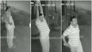 The man pretends to exercise before reaching for the bulb to steal it. (Youtube) The man pretends to exercise before reaching for the bulb to steal it. (Youtube)