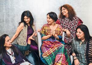 (From left) Anju Modi wears Banarasi cutwork palazzos, a chanderi kurta and bandhani cape, jewellery plus shoes (not seen in this picture) all from her own collection; Kavita Bhartia wears a crinkled garnet-hued silk dress with beige textured-hand block printed cape from her own collection and pearl earrings by Dior; Krishna Mehta wears a handwoven silk kaftan from her own brand, jewellery from Le Mill and shoes (not seen in this picture) by Stuart Weitzman; Madhu Jain wears an Uzbek bamboo silk Ikat choga, dupatta and loose pyjamas from her own brand and a South Sea pearl string; Ritu Kumar wears an ajrakh printed suit and skirt from her own brand and an antique mangalsutra from Coorg (Location courtesy: Roseate House, New Delhi; Art direction: Amit Malik; Assisted by: Ishaan Ishitava; Make-up and hair: Ambika Pillai Designer Salon)(Naina Redhu) (From left) Anju Modi wears Banarasi cutwork palazzos, a chanderi kurta and bandhani cape, jewellery plus shoes (not seen in this picture) all from her own collection; Kavita Bhartia wears a crinkled garnet-hued silk dress with beige textured-hand block printed cape from her own collection and pearl earrings by Dior; Krishna Mehta wears a handwoven silk kaftan from her own brand, jewellery from Le Mill and shoes (not seen in this picture) by Stuart Weitzman; Madhu Jain wears an Uzbek bamboo silk Ikat choga, dupatta and loose pyjamas from her own brand and a South Sea pearl string; Ritu Kumar wears an ajrakh printed suit and skirt from her own brand and an antique mangalsutra from Coorg (Location courtesy: Roseate House, New Delhi; Art direction: Amit Malik; Assisted by: Ishaan Ishitava; Make-up and hair: Ambika Pillai Designer Salon)(Naina Redhu)
