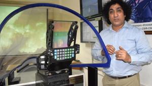 Vinod karar with the head-up display, designed by CSIR-CSIO, in Chandigarh.(Sikandar Singh Chopra/HT) Vinod karar with the head-up display, designed by CSIR-CSIO, in Chandigarh.(Sikandar Singh Chopra/HT)
