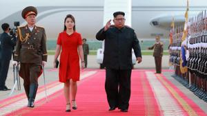 In this photo provided by the North Korean government, Kim Jong Un and his wife Ri Sol Ju arrive at Pyongyang International Airport.(AP File Photo)