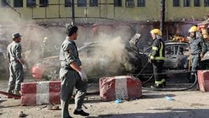 Afghan policemen inspect the site of a blast in Jalalabad city, Afghanistan on July 1.(REUTERS)