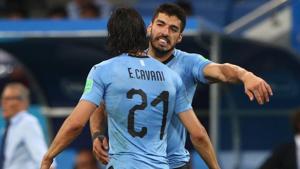 Uruguay's Edinson Cavani celebrates scoring their second goal with Luis Suarez.(REUTERS) Uruguay's Edinson Cavani celebrates scoring their second goal with Luis Suarez.(REUTERS)