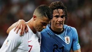 Cristiano Ronaldo (L) helps Edinson Cavani during their FIFA World Cup Round of 16 match between Uruguay and Portugal at the Fisht Stadium, Sochi, Russia on June 30, 2018.(REUTERS) Cristiano Ronaldo (L) helps Edinson Cavani during their FIFA World Cup Round of 16 match between Uruguay and Portugal at the Fisht Stadium, Sochi, Russia on June 30, 2018.(REUTERS)