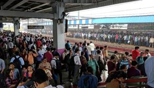 Commuters stranded at Borivili train station following a bridge collapse at Andheri station on Tuesday morning.(HT photo)