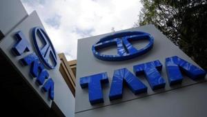 Tata Motors logos are seen at their flagship showroom before the announcement of their Q3 results in Mumbai.(Reuters File Photo) Tata Motors logos are seen at their flagship showroom before the announcement of their Q3 results in Mumbai.(Reuters File Photo)