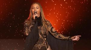 Beyonce had to be rescued by an emergency ladder when her concert stage malfunctioned.(AP) Beyonce had to be rescued by an emergency ladder when her concert stage malfunctioned.(AP)