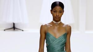 The Dior fashion show was all about going back to the basics, with a muted palette of nudes, navies and dusty pinks.(AFP) The Dior fashion show was all about going back to the basics, with a muted palette of nudes, navies and dusty pinks.(AFP)
