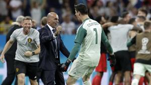 Belgium coach Roberto Martinez celebrates with Belgium goalkeeper Thibaut Courtois after winning the round of 16 match between Belgium and Japan.(AP) Belgium coach Roberto Martinez celebrates with Belgium goalkeeper Thibaut Courtois after winning the round of 16 match between Belgium and Japan.(AP)