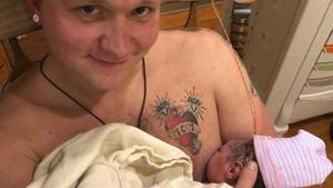 Maxamillian Neubauer feeds his newborn daughter with the help of supplemental nursing system.(Maxamillian Kendall Neubauer) Maxamillian Neubauer feeds his newborn daughter with the help of supplemental nursing system.(Maxamillian Kendall Neubauer)