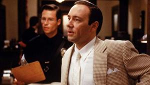 Kevin Spacey in a still from LA Confidential with Guy Pearce in the background. Kevin Spacey in a still from LA Confidential with Guy Pearce in the background.